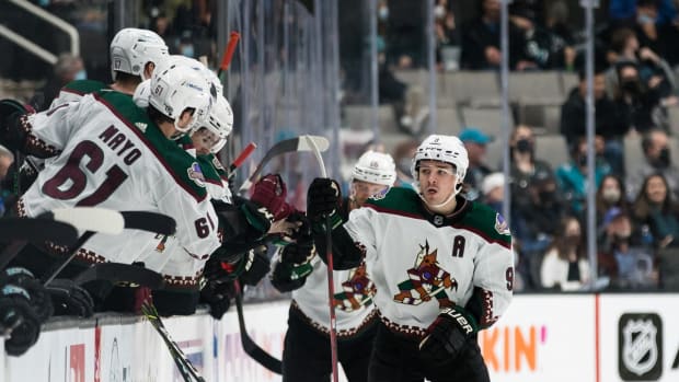 Dec 28, 2021; San Jose, California, USA; Arizona Coyotes right wing Clayton Keller (9) celebrates after scoring a goal against the San Jose Sharks during the second period at SAP Center at San Jose. Mandatory Credit: John Hefti-USA TODAY Sports